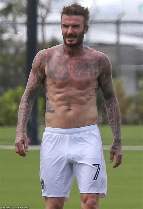 David Beckham Displays His Hunky Tattooed Torso As He Goes Shirtless For A Game Of Football