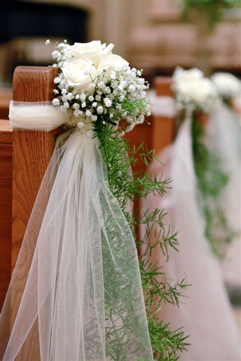 Contains the right aisle pew. Ivory Rose and Baby's Breath Ceremony Aisle Decor