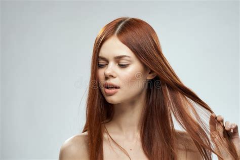 Beautiful Red Haired Woman Naked Shoulders Cosmetics Long Hair Glamor Light Background Stock
