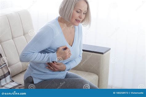 Portrait Of Middle Aged Woman Having Heart Attack Stock Image Image