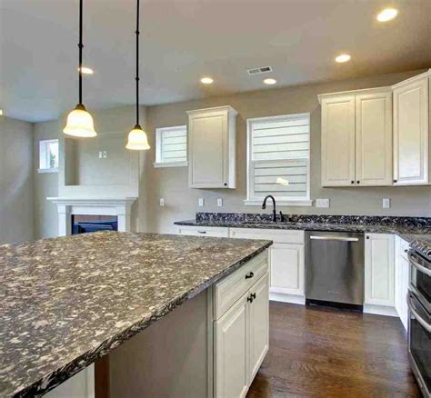 White kitchen cabinetry is timeless in appearance and opens the door to a myriad of decorating combinations. Granite Countertop Colors with White Cabinets - Home ...