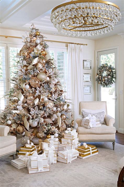 A Soft Flocked Christmas Tree Anchors This Luxe Holiday Living Room Enhance It With Faux Flower