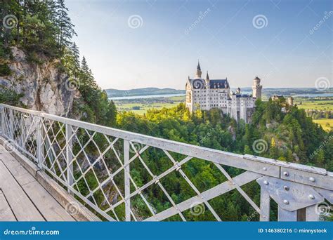 Neuschwanstein Castle With Marienbrucke Bridge At Sunset Bavaria