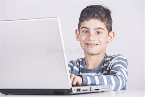 Boy Using A Laptop Computer Stock Image Image Of Young Desk 86358201