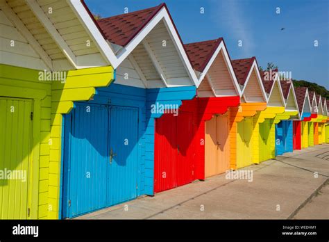 Multi Coloured Beach Huts Along The Promenade At North Bay Scarborough