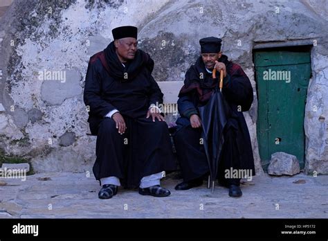 Ethiopian Orthodox Priests Sitting In Deir El Sultan Monastery Located