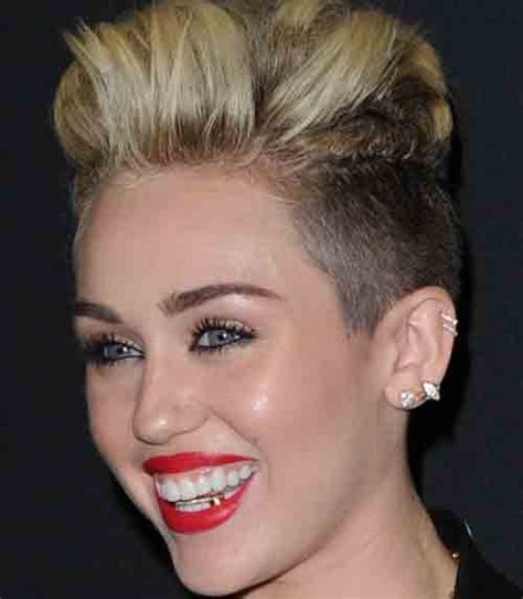 Miley Cyrus Has A Gold Tooth In Her Grill