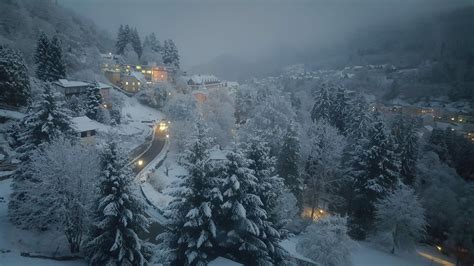 Village In Mountain Forest On Foggy Winter Night By Ralf Thomas