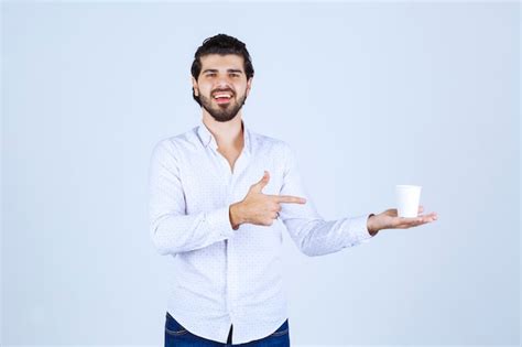 Man Holding Product Images Free Download On Freepik