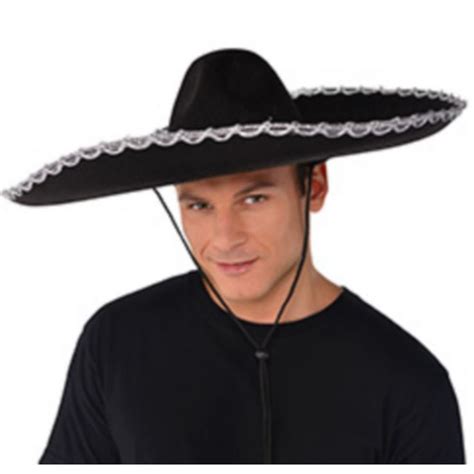 A Man Wearing A Black Sombrero Hat