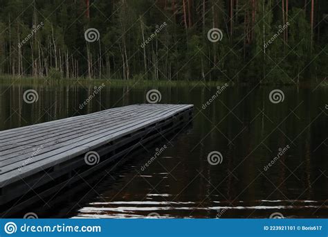 Wooden Pier On A Forest Lake At Dusk Stock Image Image Of Serene