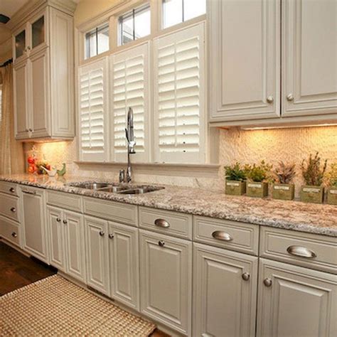 After 27 years living with her plain wood kitchen cabinets, tina was ready for a change. 70 Beautiful Farmhouse Kitchen Cabinet Makeover Ideas ...
