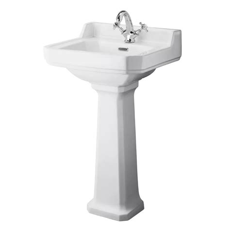Use a level to ensure that the sink remained aligned while securing. Traditional Carlton Porcelain Sink and Pedestal 20"