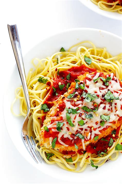 Tender chicken breast is coated with a smokey panko bread crumb mixture and baked to crispy perfection, then finished with a spicy honey drizzle. Spicy Baked Chicken Parmesan | Gimme Some Oven