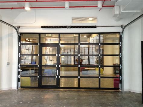 In some cases, expenses can be lower due to the ample availability of natural light, which can be an invaluable asset. NY Loft - Black Aluminum Garage Door & Clear Glass with ...