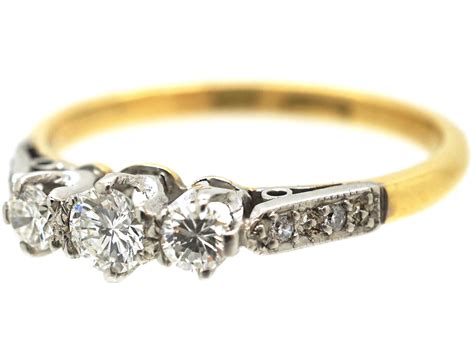 18ct Gold And Platinum Three Stone Diamond Ring With Diamond Set