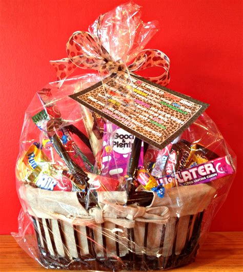 The birthday gift basket includes birthday cake brittle, sea salt chocolate toffee, lindor strawberry truffles, wild thyme and rosemary. african desserts: 50th Birthday Candy Basket and Poem