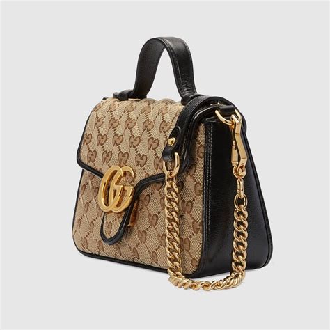 Shop The Gg Marmont Mini Top Handle Bag In Beige At Guccicom Enjoy