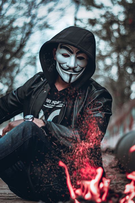 Jika kamu penggemar game yang satu ini, pastinya mau dong wallpaper free fire untuk melengkapi koleksi kamu? Person Wearing Guys Fawkes Mask Watching Flame blurred ...