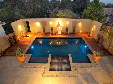 Large outdoor pool with two story covering built in wood. 25 Impressive Inground Hot Tub and Pool Ideas For Your ...