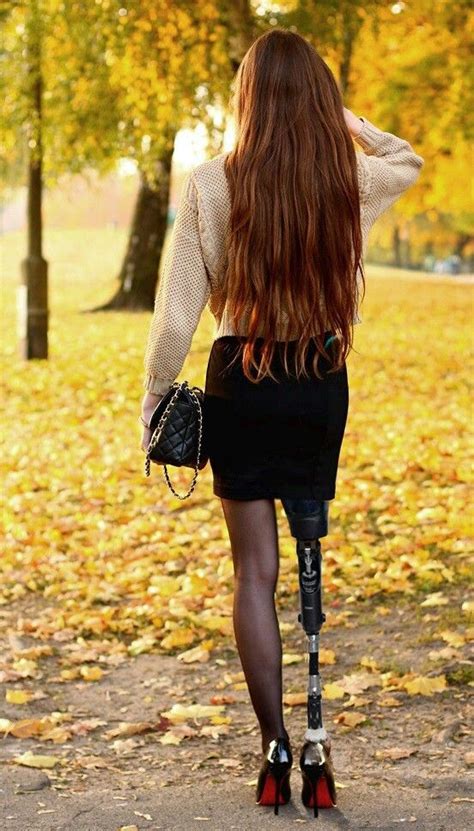 Woman Walking In The Park On Crutches