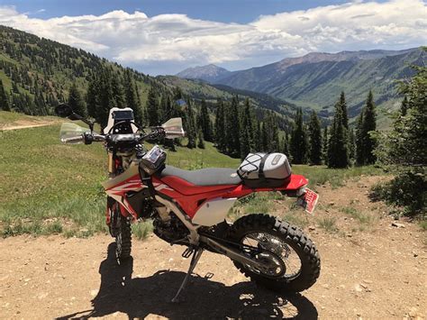 Other key features include rugged bomb shell™ coated fabric construction the clear smartphone/map lid pocket also allows glances at maps or notifications. Zigzag Bag and Buckin' Roll Bag on a Honda CRF450L in ...