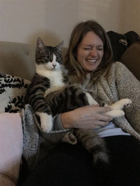 My girlfriend and her sweet rescue. All cats have wildly different