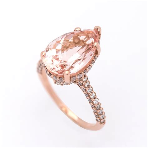 This halo ring is crafted from solid 14k white gold with genuine diamonds and natural gemstones. Pear Shape Pink Morganite Ring - Christine K Jewelry