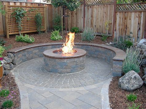 I keep the stone of shame behind the firepit (next to the stone of triumph). Gilirani Pavers Plus | Seattle WA
