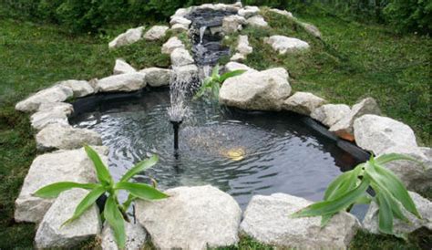 This pool fountain's design features a large, adjustable jet of water to create a perfect water shower. Diy Fountain Pond | Pool Design Ideas