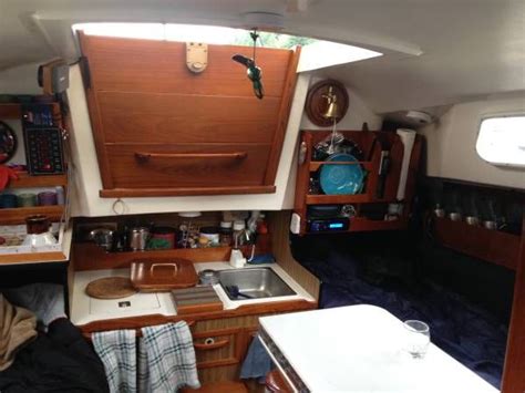 Cuddy cabins are best suited for day cruising, with limited amenities and modest cabin accommodations. PY 23 Paceship sailboat | Sailboat interior, Camping ...
