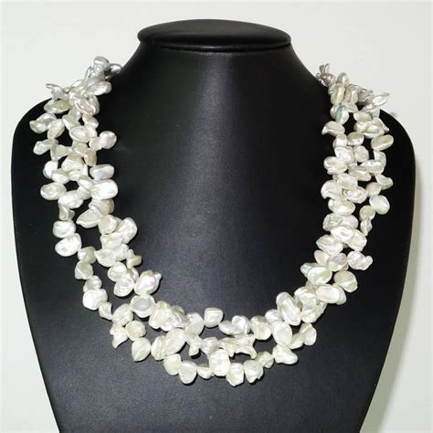 Triple Strand Of Iridescent White Biwa Pearl Necklace With Sterling