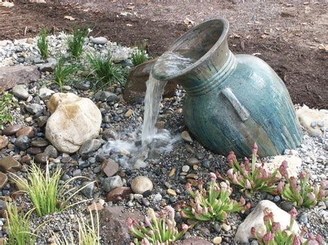 How do i make a garden water feature. backyard water feature | Garden water fountains, Fountains ...