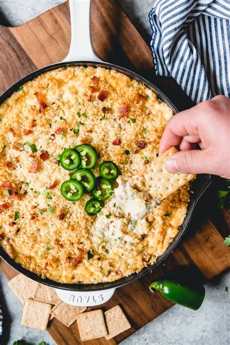An Image Of Jalapeno Popper Dip With Bacon Cooked In A Cast Iron