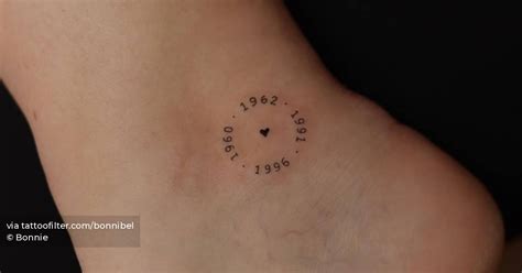 Birth Years In The Shape Of A Circle Tattooed On The