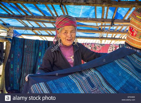 Hmong woman with indigo clothes on sale, Sapa hill tribe region Stock Photo - Alamy