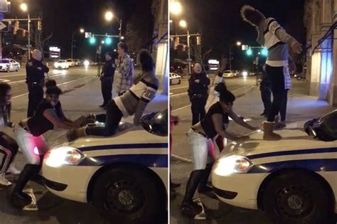 police officer allows girls twerk on his patrol car after being denied entry into a club vid