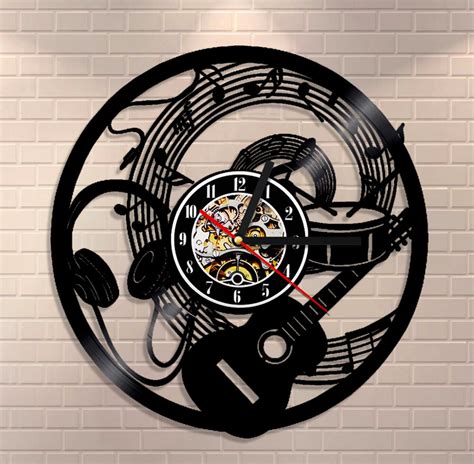 This record clock is a fantastic design and would make an excellent gift for a music lover! 1Piece Musical instruments Design Vinyl CD Wall Clock Room ...
