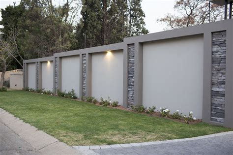 The fence featured above uses a spaced lattice a very practical fence design to enclose a large space, but probably not what you are looking for match the siding of your house or go all out with a technicolor rainbow design, just make sure to use. Home - The Creative Stone | Fence wall design, Exterior ...