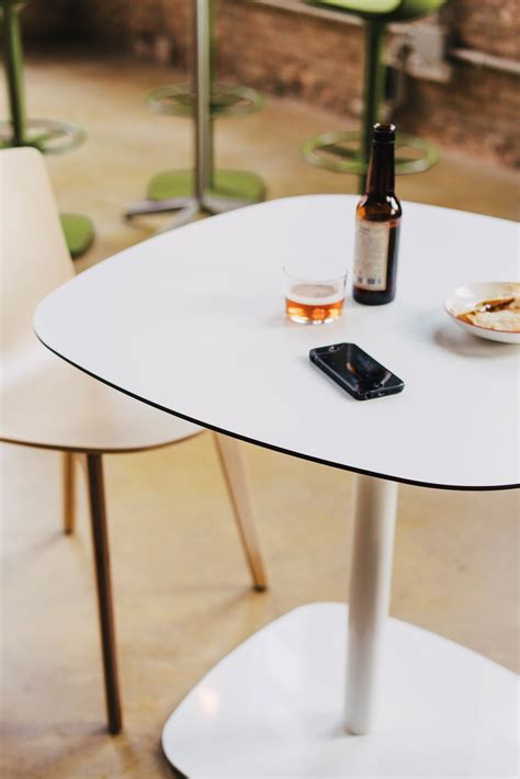 Table tops available in laminate or solid wood. Lottus Tables - Enea