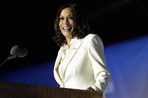 kamala harris victory speech outfit white suit pussy bow blouse footwear news