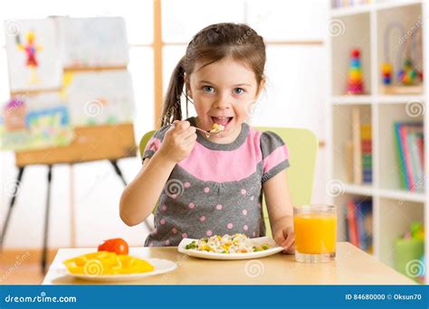Kid Girl Eating Healthy Food At Home Stock Photo Image Of Drink