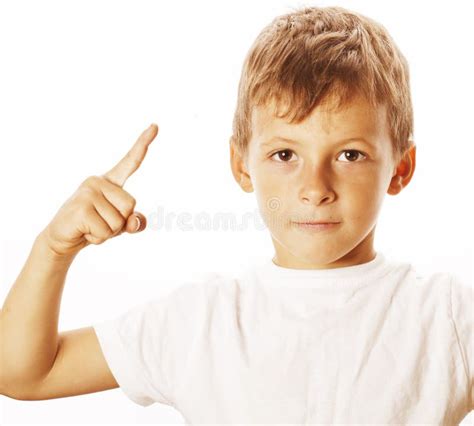 Little Cute White Boy Pointing In Studio Isolated Close Up Stock Photo
