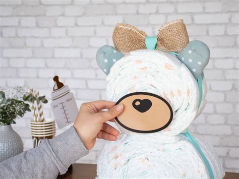 Creating The Face Of The Teddy Bear Diaper Cake With Construction Paper