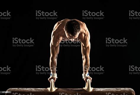 Male Gymnast Doing Handstand On Pommel Horse Stock Photo Download