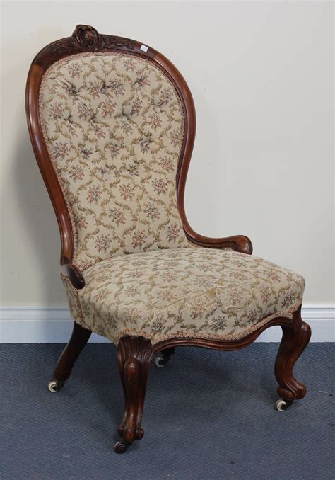 A Late Victorian Walnut Showframe Ladys Salon Chair Raised On Carved