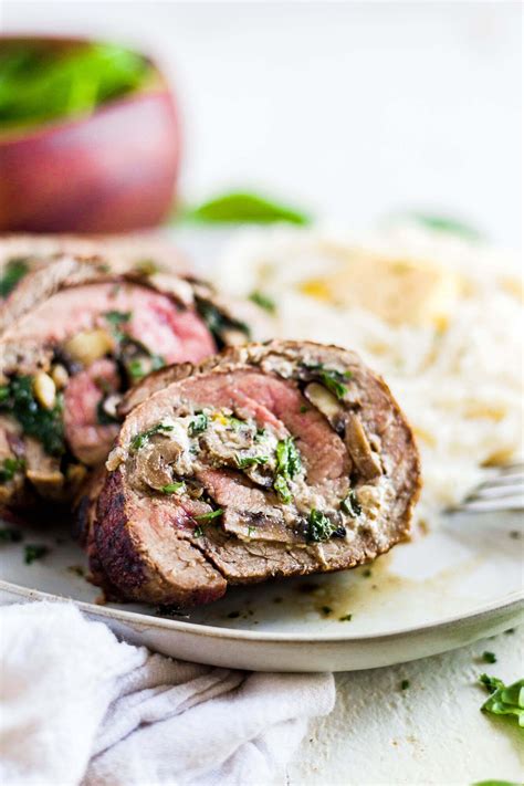 This Oven Baked Stuffed Flank Steak With Mushroom And Spinach Is Rolled And Cooked To Perfection