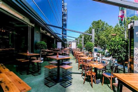 Take a seat at the bar and enjoy the show. Hopscotch - Best Cocktail Bars - Hidden City Secrets
