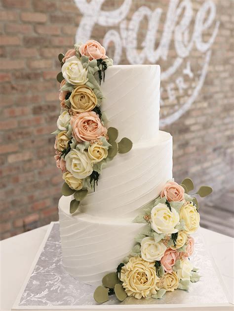 Buttercream Iced Rough Texture Finish Wedding Cake With Buttercream Flowers