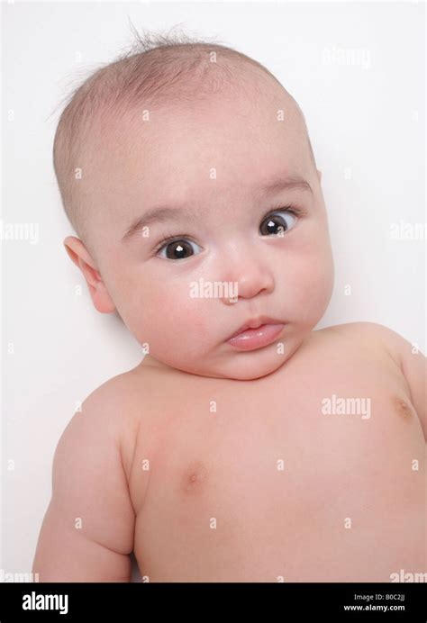 Baby Boy Lying Down On White Background Close Up Stock Photo Alamy